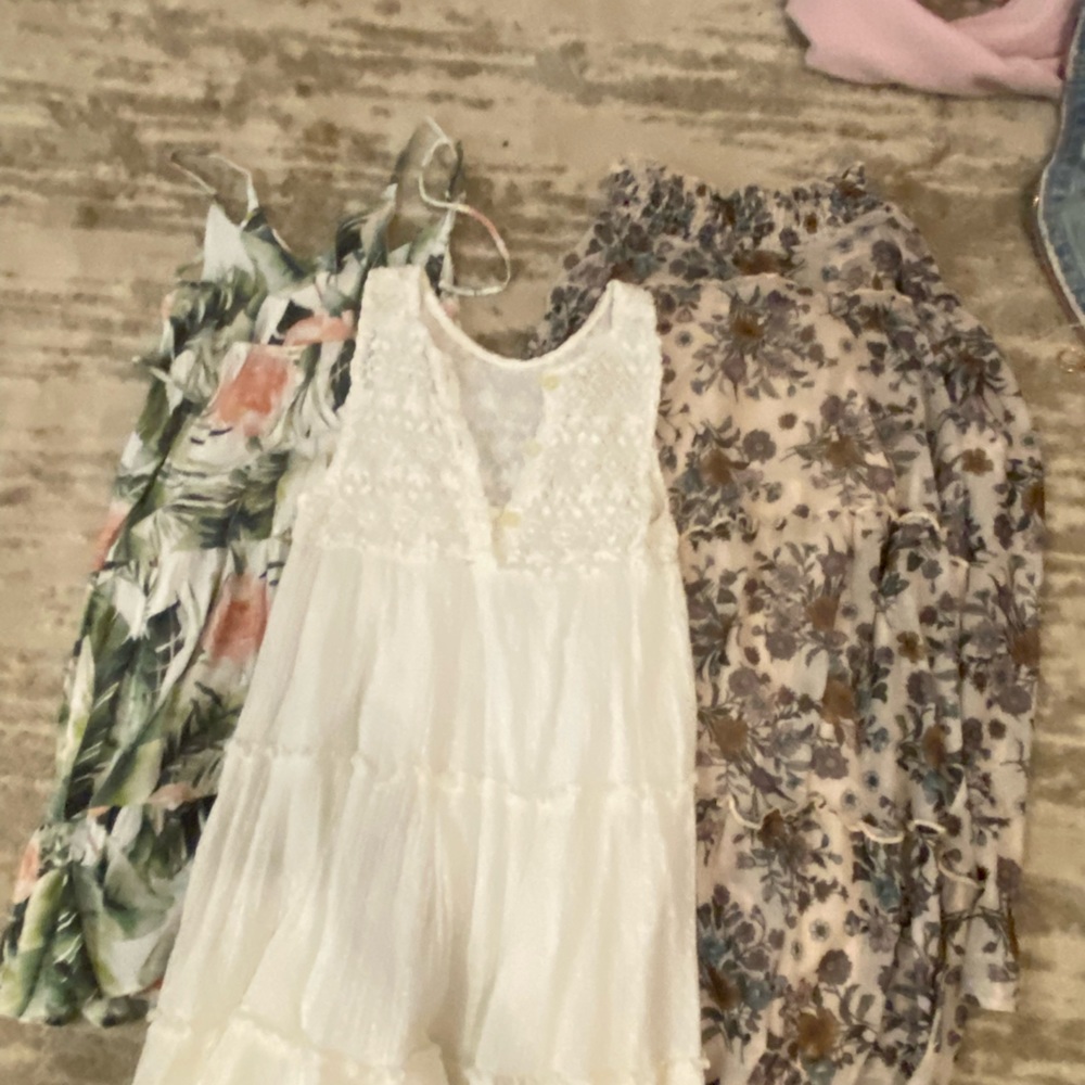 Fun pretty colorful dresses selling because to small